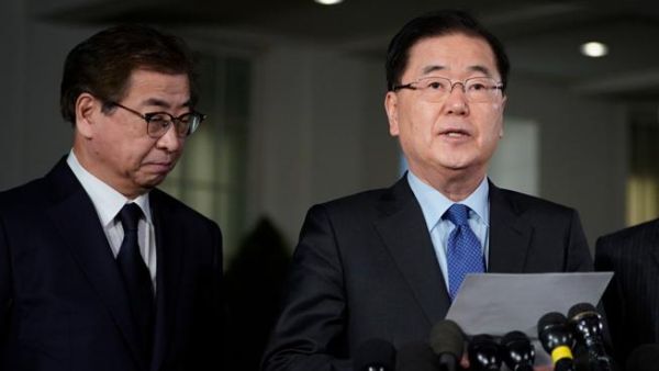 South Korean National Security Advisor Chung Eui-yong, right, briefs reporters outside the West Wing of the White House in Washington. (AFP/ File)