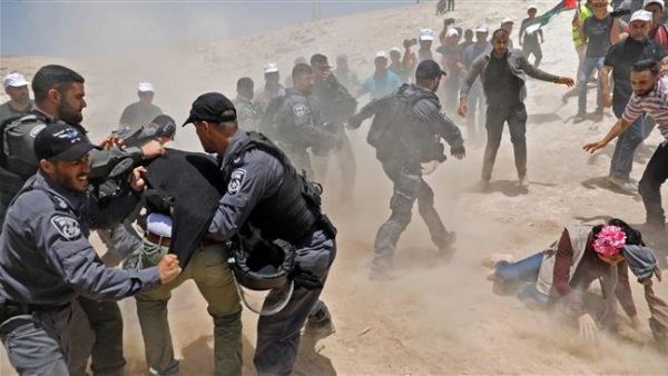 Protesters clash with Israeli police in the Palestinian Bedouin village of Khan al-Ahmar in the occupied West Bank. (AFP/File)