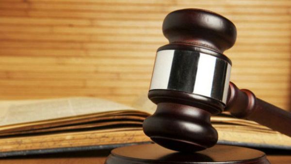 Two Nigerian men were sentenced to life on Wednesday after a federal high court found them guilty of masterminding the Oct. 1, 2010 bombing. (AFP/ File Photo)