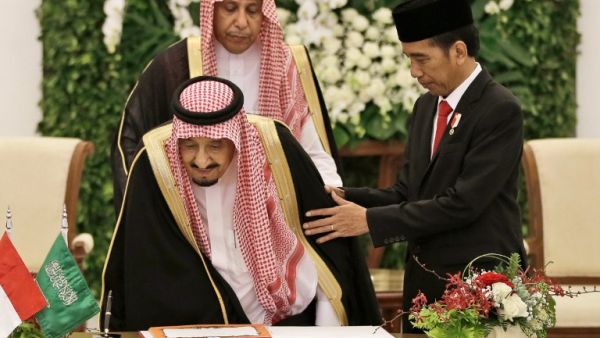 Jakarta and Riyadh also inked an agreement that builds on an existing $6 billion deal between state-owned energy firms Aramco and Pertamina to expand an Indonesian oil refinery.  (AFP/Achmad Ibrahim)