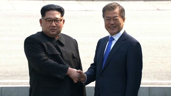 North Korea's leader Kim Jong-Un (L) and South Korea's President Moon Jae-in shaking hands at Inter-Korean Summit. (AFP/ File Photo)