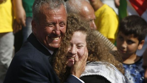 Palestinian teen Ahed Tamimi freed after 8 months detention for slapping Israeli soldiers on West Bank (Twitter)