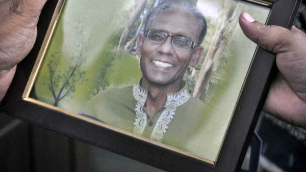 A photo of the slain professor. (AFP/Abdullah Iqbal)