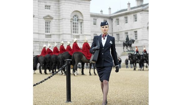 British Airways purser and The Royal Guard in London full-body. British Airways purser and The Royal Guard in London full-body.