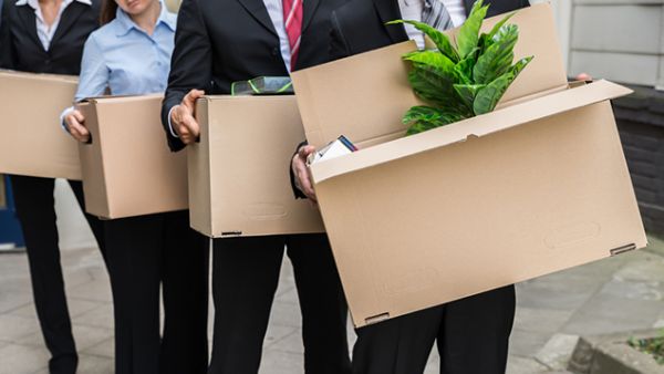 Some institutions in Lebanon are paying half a salary to their staff while others resort to arbitrary layoffs with no compensation. (Shutterstock)