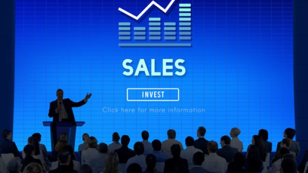 The slides on the screen is only part of your presentation; consider your own appearance and manner. (Shutterstock)