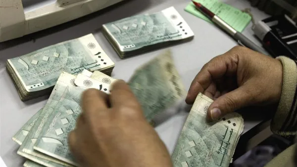 Salaries can play a huge role in assessing job satisfaction. (File photo)