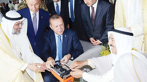 The Emir of Kuwait Sheikh Sabah Al-Ahmed Al-Jaber Al-Sabah and Turkish President Recep Tayyip Erdogan lay the foundation stone for construction of the new terminal at Kuwait International Airport in Kuwait City on May 9, 2017. (AFP)