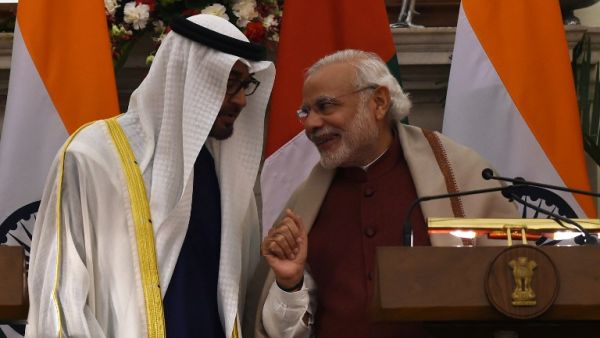 Indian Prime Minister Narendra Modi (R) shares a light moment with Abu Dhabi's Crown Prince Sheikh Mohammed bin Zayed al-Nahyan at Hyderabad House in New Delhi on February 11, 2016. (AFP/Money Sharma)
