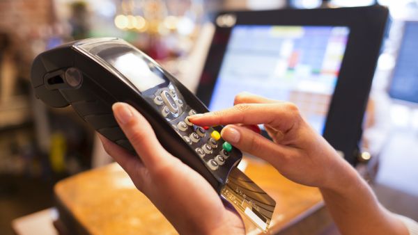 Authorities have circulated information to businesses warning them against charging customers extra for choosing to pay with a credit card. (Shutterstock)