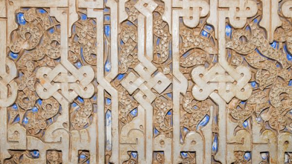 Detail of ancient arabic carving, La Alhambra, Granada, Spain. (Shutterstock)