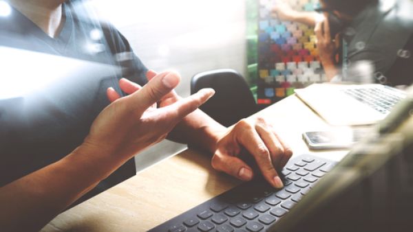 One of the perks of having your own desk at the office is the ability to personalize it in a way that makes you comfortable and more productive. (Shutterstock)