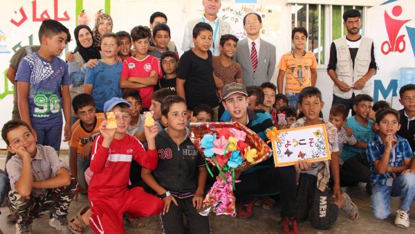 The paintings Ala did with her feet are displayed outside the Mafraq Makani Centre. (Twitter)