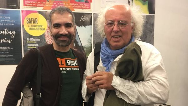 Koutaiba Al-Janabi and Joseph Fahim entering the theatre for the European premiere of Stories of Passers Through Safar Film Festival (Twitter)
