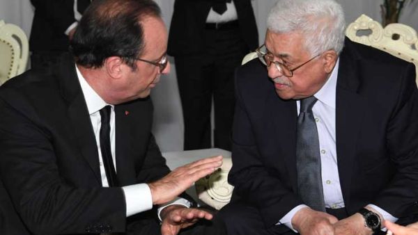 أولاند يشيد بمشاركة عباس في جنازة بيريز 
