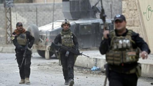 عناصر من وحدات العمليات الخاصة العراقية في حي البكر
