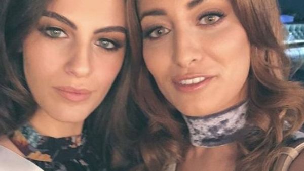 ملكة جمال العراق (يمين) مع ملكة جمال إسرائيل
