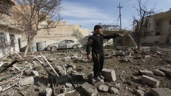 العثور على 500 جثة بمقبرتين جماعيتين غرب الموصل 
