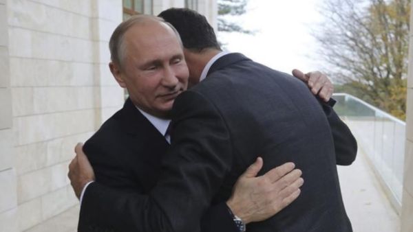 بوتين محتضنا الاسد