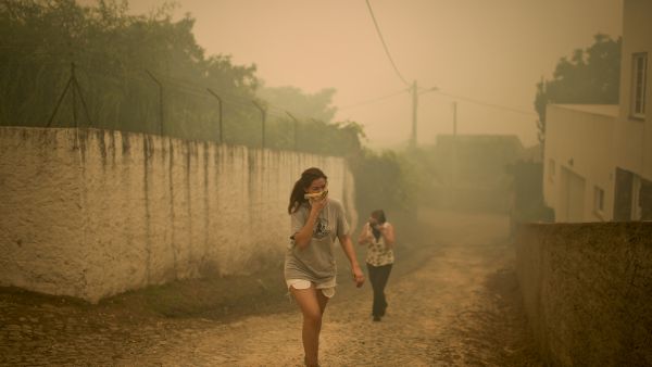 Mayor of Pedrogao Grande, Valdemar Alves, said that some villages had been "completely surrounded by flames." (AFP) 