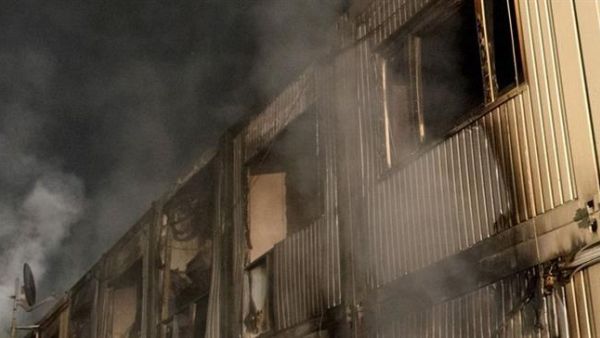 A smoke from a suspected arson attack coming out of a building sheltering refugees in western Germany. (AFP/ File Photo)