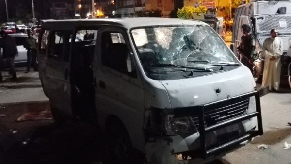 The remains of the police bus, shot at by multiple masked gunmen. (AFP/Stringer) The remains of the police bus, shot at by multiple masked gunmen. (AFP/Stringer)