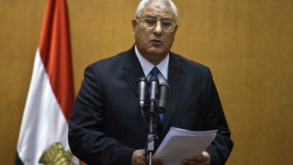 Egypt's interim President Adly Mansour addresses the country after he's sworn in (AFP)