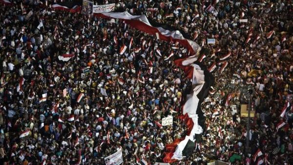 EGYPT, Cairo : Egyptian supporters of Egyptian Armed Forces General Ahmed Fattah al-Sisi rally at Tahrir Square in Cairo on July 26, 2013. AFP PHOTO / KHALED DESOUKI