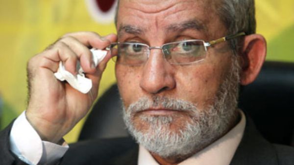 Muslim Brotherhood Supreme Guide accused of enticing violence during clashes between pro-Morsi protesters and the police. [theguardian/EPA]