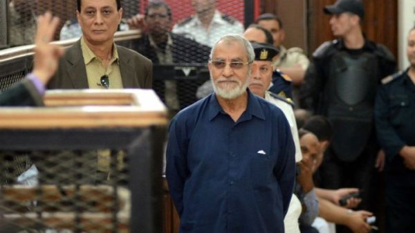 Muslim Brotherhood leader Mohamed Badie stands in front of the judges during his trial in the capital Cairo on May 18, 2014. (AFP/Ahmed Gamel)
