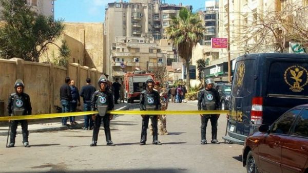 Egyptian riot police cordon off the street at the site of a bomb attack in the northern city of Alexandria, which hit a convoy of the city’s security chief, on March 24, 2018. (AFP/ File Photo)