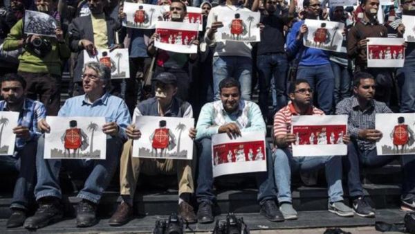 Journalists and photojournalists demonstrate in Cairo against repeated attacks on members of the press in Egypt (AFP)
