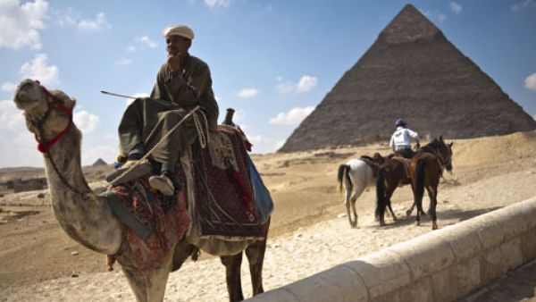 A total of 41,042 Egyptian and foreign tourists visited the Giza Pyramids during the three days of Eid. (AFP/File)