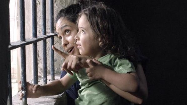 The film is the story of a young newlywed Palestinian school teacher who is jailed in a top-security Israeli prison where she eventually gives birth. (TIFF)
