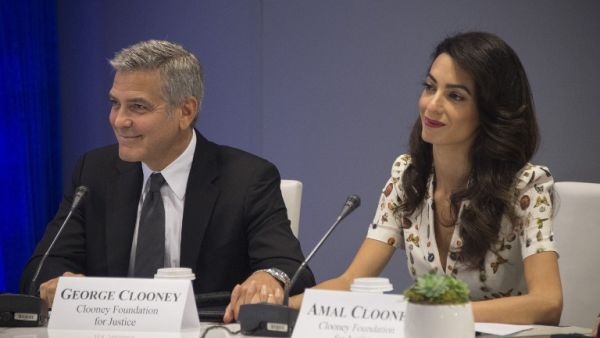 George and Amal at the CEO Roundtable, on the sidelines of the 71st session of the UN General Assembly in New York.  (AFP/Jim Watson)