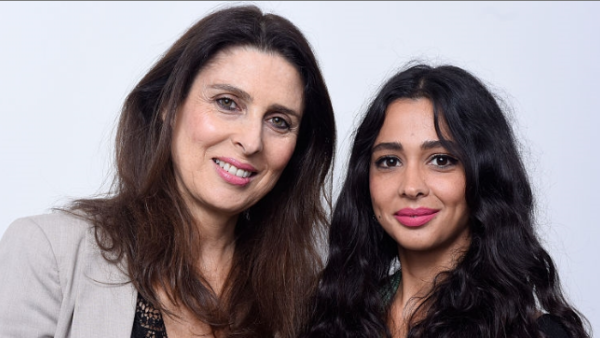 Palestinian director Mai Masri (L) with the star of 3000 Nights Maisa Abd El Hadi, at the Toronto Film Festival. (AFP/Jeff Vespa)
