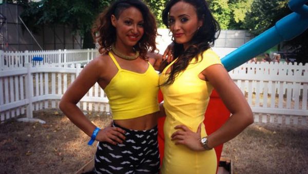 Amelle Berrabah (L) sportin' her outfit that was not sunlight proof! (Image: Twitter)