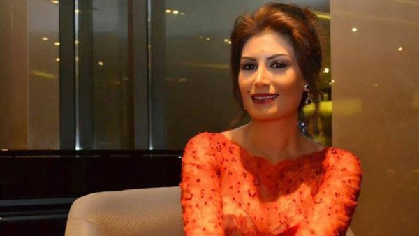 She may be all smiles in pictures, but Ruwaida is one troubled singer. (Image: Facebook)