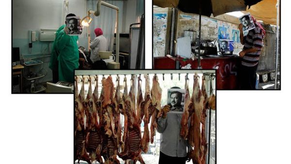 Saddam's face shot covers the heads and minds of Iraqi citizens