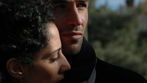 Saleh Bakri with Suheir Hammad in a still from Salt of the Sea. (IMDB)