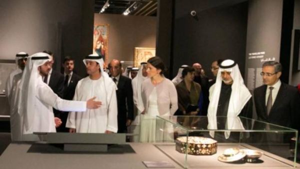 Shaikh Hazza Bin Zayed and other guests look at some of the Louvre's permanent pieces during the 'Birth of a Museum' exhibition.
