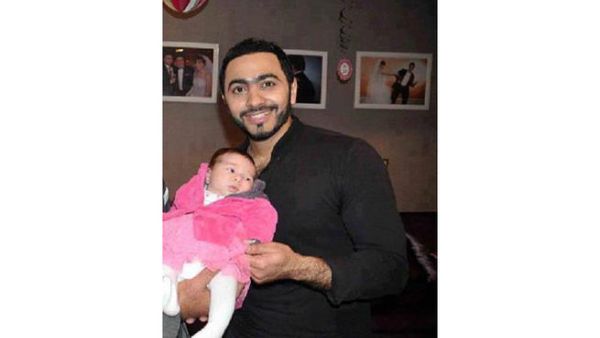 Tamer digs being a daddy