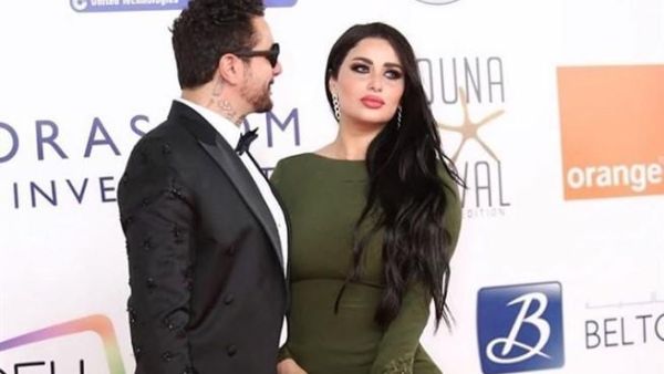 أحمد الفيشاوي وزوجته ندى كامل