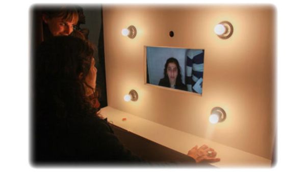 Lady tries photo-booth installation at Medrar Gallery, Friday 22 February. Photo: Mostafa Sheshtawy