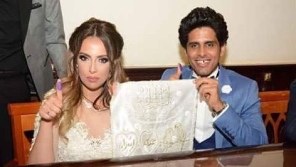 اسراء عبدالفتاح وحمدي الميرغيني