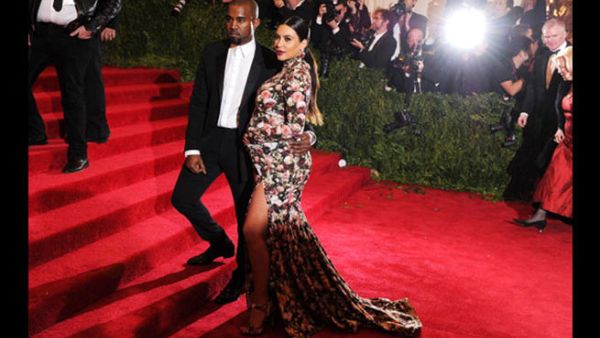 Kim Kardashian and Kanye West (below prior to the birth of their child) want their destination wedding in Egypt, says the celebrity rumor mill (Photo by Dimitrios Kambouris/Getty Images)
