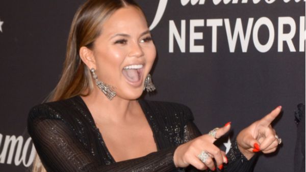 Chrissy uploaded a professional shot taken from the Grammy Awards red carpet earlier in the evening, where her burgeoning bump is on full display (Source: Kathy Hutchins - Shutterstock)