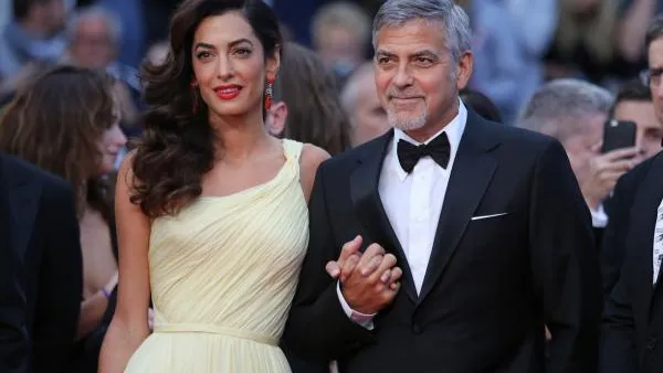 George and Amal Clooney, proud (and angry) parents. (David Silpa / UPI)