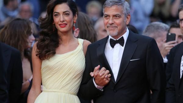 George and Amal Clooney, proud (and angry) parents. (David Silpa / UPI)