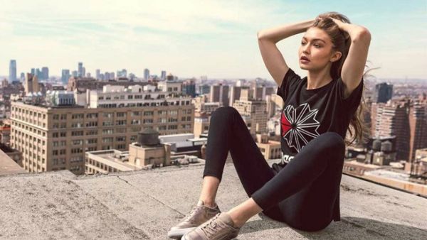 Gigi Hadid is collaborating with Reebok to sell Reebok Club C 85 and Classic Leather in two colorways, Pearl Met and Grey Gold. (Reebok)